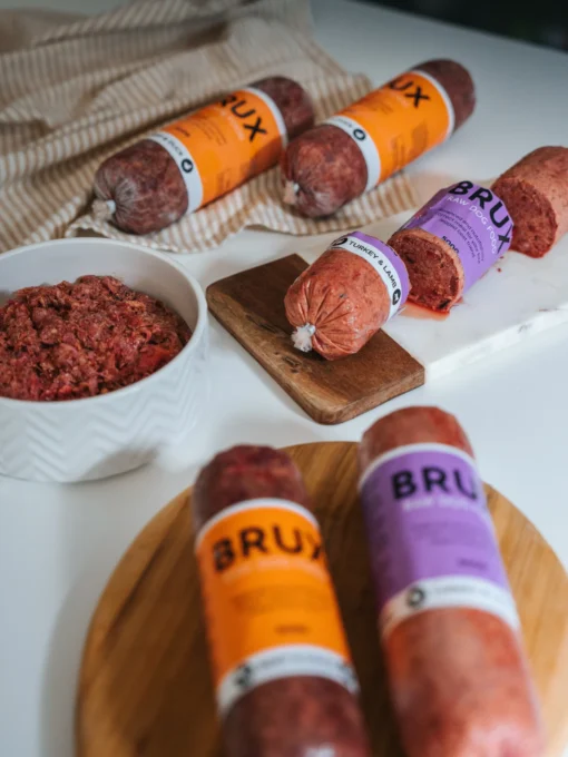 brux raw food tubes with dog food bowl